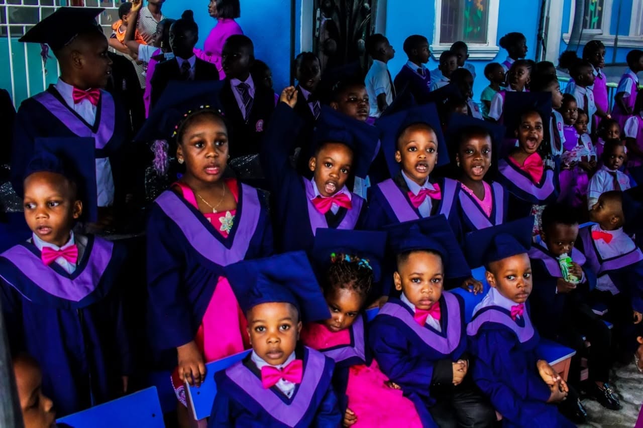 Young graduates at a ceremony